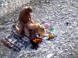 Great blonde beach voyeur facial