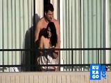 Cute milf caught getting fucked on a hotel balcony