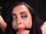 Bondage subject drooling while toyed by her bdsm maledom