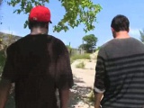 Black thug sucks a big hairy cock outdoors